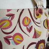 Detail of folk print design on a 100% organic cotton apron