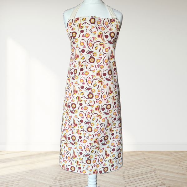 Organic cotton apron with art nouveau folk print, handmade in the UK