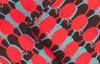 Abstract teasel print from Edge of the Meadow. A set of 4 striking retro style cotton napkins with a bold red, grey and chocolate brown patterned teasel print. 