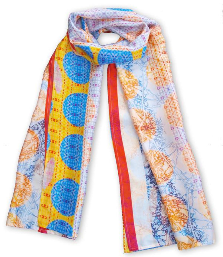 This scarf features geometric shapes and branch outlines. The print can look dramatically different depending on how you like to wear it.  Each print is a one off, which makes it a luxurious gift, or a special treat for yourself.  The scarves are designed to be worn as a statement piece with an   elegant outfit or tied snugly for a more casual look. Habotai silk   has a smooth texture, and is both light weight and warm